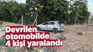 Devrilen otomobildeki 4 kişi yaralandı