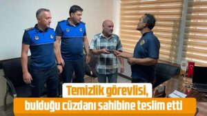 Temizlik görevlisi, bulduğu cüzdanı sahibine teslim etti